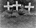 Grave markers of Trooper R Hillyer, Sergeant T J Bingle and Lieutenant N R Cleaver, 3rd/4th County of London Yeomanry (Sharpshooters), and Rifleman Bishop, 2nd Battalion, King's Royal Rifle Corps, Rouffigny, Normandy, 1944