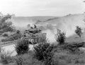 Sherman tanks on the move through the dust during the march to the River Somme, 1944