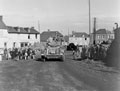 An armoured car passing through Grand VIilliers, 1944