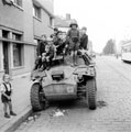 French children on a Humber Scout Car, 1944