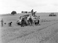 Civilians gather around a Sherman tank of the 3rd/4th County of London Yeomanry (Sharpshooters), Belgium, 1944
