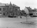 'Members of the White Brigade marching German prisoners into prison during our temporary occupation of Cruyshautem', Belgium, 1944