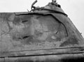 The side of a Panther tank turret, cracked by three glancing blows of 75mm HE