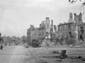 Sappers at work clearing the wreckage from the streets of Caen, 1944