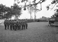 Captain Jimmie Manners taking HQF Troop parade at Velveeken, 1944