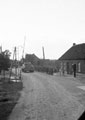 Sherman tanks passing through a border post between Belgium and the Netherlands, 1944