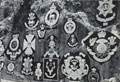 Regimental badges on a rock face at Cherat, 1932 (c)