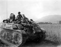 An American APC driving through open country, 1944