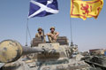 Black Watch Warrior armoured vehicle flying Scottish flags, Iraq, October, 2004