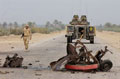 Commanding Officer, Black Watch, walks from his Warrior to the scene of a vehicle bomb, Iraq, October 2004