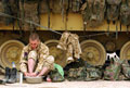 A corporal from 1st Battalion Irish Guards, 7 Armoured Brigade (Desert Rats), gives his feet a good wash, Iraq, March, 2003