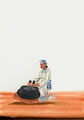 Indian man with mortar and pestles, 1860 (c)