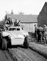 Major Toby Thwaites (in raincoat) on his scout car at Weert', 3rd County of London Yeomanry (Sharpshooters), Netherlands, 1944