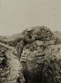 Soldier with rifle in trench, 1917 (c)