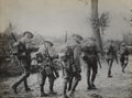 Gassed British soldiers marching along a French road, 1916 (c)