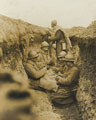 French troops playing cards in a trench on the Western Front, 1916 (c)