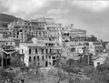 Hillside town with bomb damage, Sicily, 1943