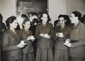 Members of the  West Indies Auxiliary Territorial Service drinking tea, 1943 (c)