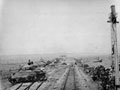 Crossing the railway on the advance to Priolo, 1943