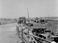 Recovery vehicle with wrecked and ditched vehicles at the southern end of Primosole Bridge, Sicily, 1943