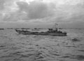 'An LCT, part of the convoy, passing through other shipping assembling in the Solent', June 1944