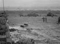 Invasion craft off King Beach with tanks and AFVs de-waterproofing, Normandy, June 1944