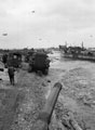'A' Squadron tanks, having just landed, proceeding along the beaches to the de-waterproofing area, Normandy, 7 June 1944