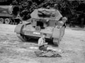 John Oldfield, 3rd County of London Yeomanry (Sharpshooters), seated in front of a Cruiser tank, Westbury, Wiltshire, 1941