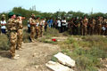 Members of the Intelligence Corps gather at Basra War Cemetery, Iraq, 2003