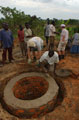 Volunteers from Tayforth University Officer Training Corps assisting in the construction of a well in the Kamuli district of Uganda, 2003