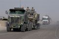 Warrior Infantry Fighting Vehicle of The Black Watch Battle Group on board an American Oshkosh Heavy Equipment Transporter, Iraq, October, 2004