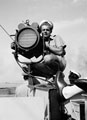Sailor with Aldis signal lamp, 1943