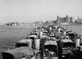 'Approaching the inner basin'. Allied landing ships approach the Ponte Girevole, Taranto, Italy, 1943