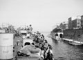 'Passing thru to the inner basin'. Allied landing ships approach the Ponte Girevole, Taranto, Italy, 1943