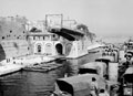 'Passing the swing bridge'. Allied landing ships approach the Ponte Girevole, Taranto, Italy, 1943