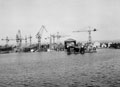 Shipyards, inner basin, submarine in dry dock, Taranto, Italy, 1943
