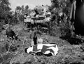 Souvenirs including a captured Nazi flag arranged in front of a Sherman tank, 1943