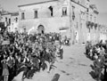 Italian civilians greet men of the 3rd County of London Yeomanry (Sharpshooters) on their arrival at Serracapriola, Italy, 1943