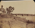 Iron bridge with stone piers, with civilians in the foreground, Gumti River, Lucknow, 1859 (c)