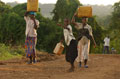Villagers walking with water containers in Kamuli district of Uganda, 2003