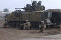 A Company The Black Watch provide security for engineers constructing a bridge, Latifiyah, Iraq, 2004