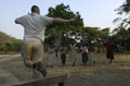 An Army Cadet officer with Malawaian children in Wisikoti, Malawi, 2002