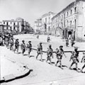 5th Battalion, Northamptonshire Regiment, entering the town of Adrano, Sicily, August 1943