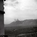 Allied bombers hitting the monastery at Monte Cassino photographed from a forward observation point, February, 1944