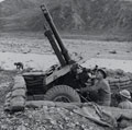 A 25-pounder gun of 78th Division in the high-angle firing position, Italy, December 1944