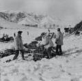 Ammunition being prepared for firing and mortars in action in the snow, 1945