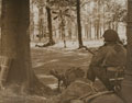 A paratrooper armed with a PIAT covers a road at Arnhem, 1944