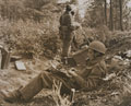 War correspondent Alan Wood typing out a despatch, 1944