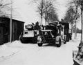 '3.7 AA guns passing the Squadron who were waiting to return to Asten', Netherlands, January 1945