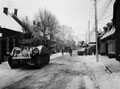 '"A" Squadron tanks unloading in Molenstraat, Asten, after their return from Wanssum', Netherlands, January 1945